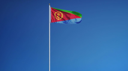Eritrea flag waving against clean blue sky, close up, isolated with clipping path mask alpha channel transparency