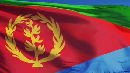 Eritrea flag waving against clean blue sky, close up, isolated with clipping path mask alpha channel transparency