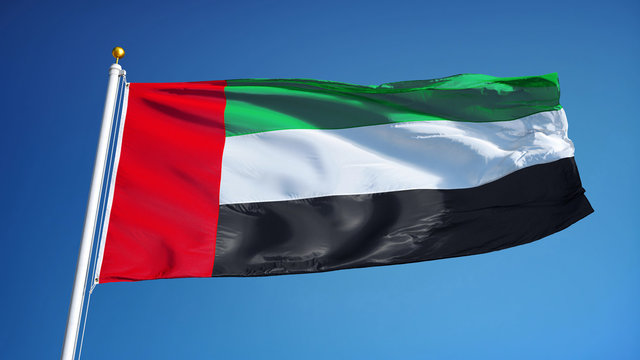 Emirates flag waving against clean blue sky, seamlessly looped close up, isolated with clipping path mask alpha channel transparency