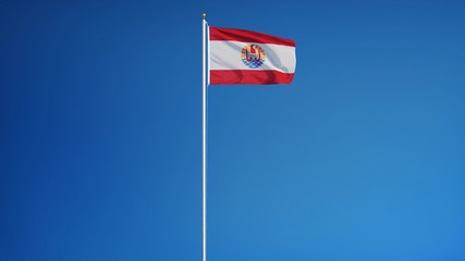 French Polynesia flag waving against clean blue sky, long shot, isolated with clipping path mask...