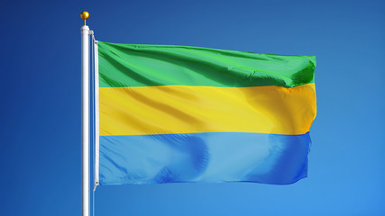 Gabon flag waving against clean blue sky, close up, isolated with clipping path mask alpha channel transparency