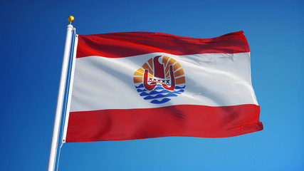 French Polynesia flag waving against clean blue sky, close up, isolated with clipping path mask alpha channel transparency