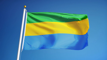 Gabon flag waving against clean blue sky, close up, isolated with clipping path mask alpha channel transparency