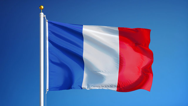France flag waving against clean blue sky, close up, isolated with clipping path mask alpha channel transparency
