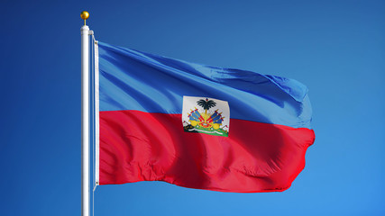 Haiti flag waving against clean blue sky, close up, isolated with clipping path mask alpha channel transparency