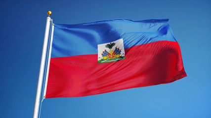 Naklejka premium Haiti flag waving against clean blue sky, close up, isolated with clipping path mask alpha channel transparency