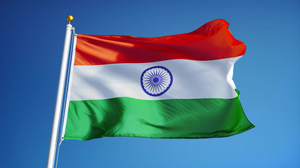 India flag waving against clean blue sky, close up, isolated with clipping path mask alpha channel transparency