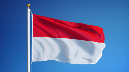 Fototapeta na wymiar Indonesia flag waving against clean blue sky, close up, isolated with clipping path mask alpha channel transparency