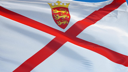 Jersey flag waving against clean blue sky, close up, isolated with clipping path mask alpha channel...