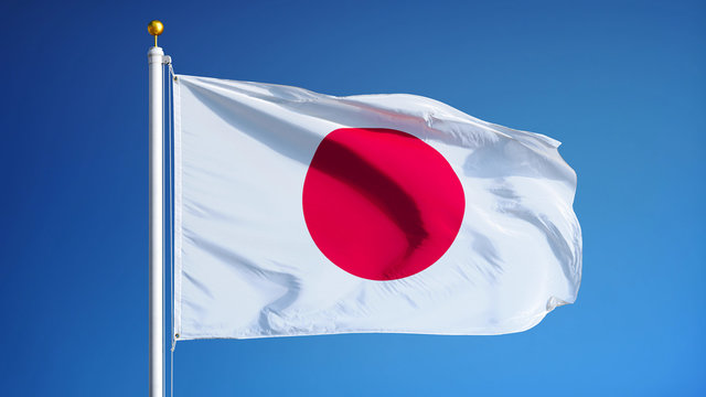 Japan flag waving against clean blue sky, close up, isolated with clipping path mask alpha channel transparency
