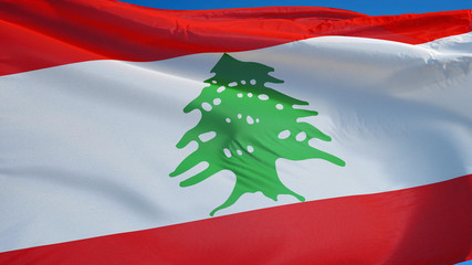 Lebanon flag waving against clean blue sky, close up, isolated with clipping path mask alpha...