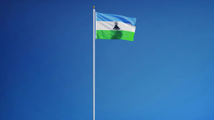 Lesotho flag waving against clean blue sky, long shot, isolated with clipping path mask alpha channel transparency