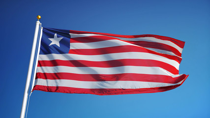 Liberia flag waving against clean blue sky, close up, isolated with clipping path mask alpha...