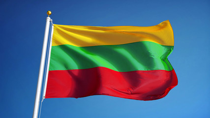Lithuania flag waving against clean blue sky, close up, isolated with clipping path mask alpha channel transparency