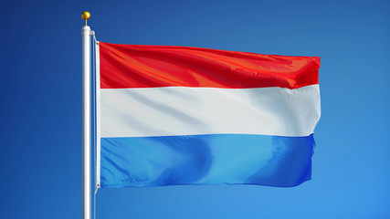 Luxembourg flag waving against clean blue sky, close up, isolated with clipping path mask alpha channel transparency