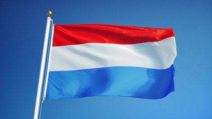 Luxembourg flag waving against clean blue sky, close up, isolated with clipping path mask alpha channel transparency
