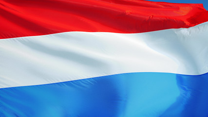 Luxembourg flag waving against clean blue sky, close up, isolated with clipping path mask alpha channel transparency