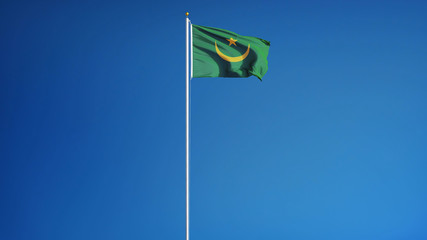 Mauritania flag waving against clean blue sky, long shot, isolated with clipping path mask alpha channel transparency