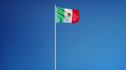 Mexico flag waving against clean blue sky, long shot, isolated with clipping path mask alpha channel transparency