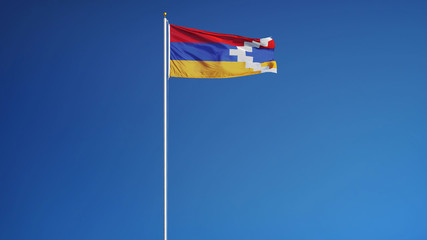 Nagorno-Karabakh flag waving against clean blue sky, long shot, isolated with clipping path mask alpha channel transparency