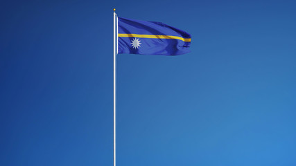 Nauru flag waving against clean blue sky, long shot, isolated with clipping path mask alpha channel...