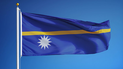 Nauru flag waving against clean blue sky, close up, isolated with clipping path mask alpha channel transparency