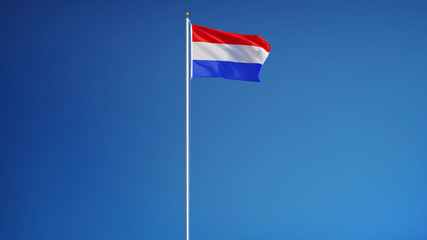 Holland flag waving against clean blue sky, long shot, isolated with clipping path mask alpha channel transparency