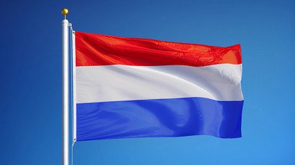 Holland flag waving against clean blue sky, close up, isolated with clipping path mask alpha channel transparency