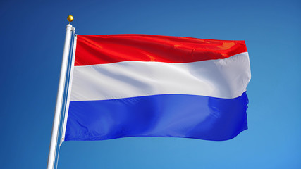 Fototapeta na wymiar Holland flag waving against clean blue sky, close up, isolated with clipping path mask alpha channel transparency