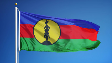 New Caledonia flag waving against clean blue sky close up, isolated with clipping path mask alpha channel transparency