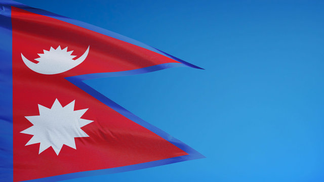 Nepal flag waving against clean blue sky, close up, isolated with clipping path mask alpha channel transparency