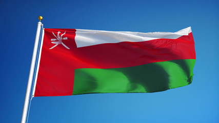 Oman flag waving against clean blue sky, close up, isolated with clipping path mask alpha channel transparency