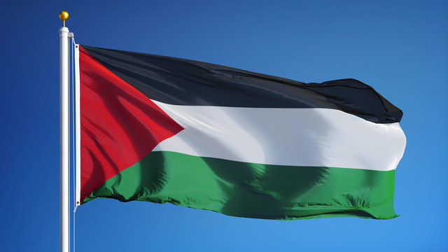 Palestine flag waving against clean blue sky, close up, isolated with clipping path mask alpha channel transparency