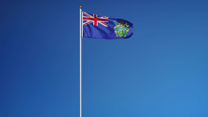 Pitcairn Islands flag waving against clean blue sky, long shot, isolated with clipping path mask alpha channel transparency