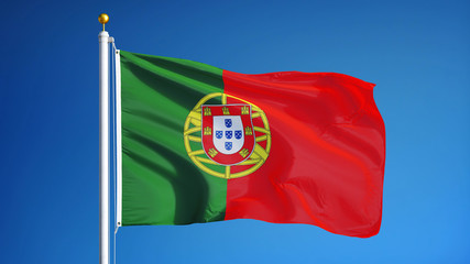 Portugal flag waving against clean blue sky, close up, isolated with clipping path mask alpha channel transparency