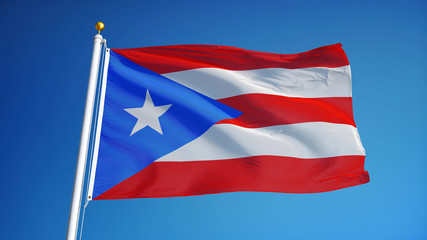Fototapeta premium Puerto Rico flag waving against clean blue sky, close up, isolated with clipping path mask alpha channel transparency