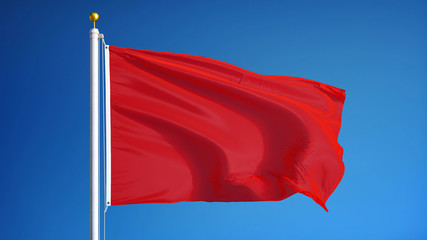 Naklejka na ściany i meble Red flag waving against clean blue sky, close up, isolated with clipping path mask alpha channel transparency
