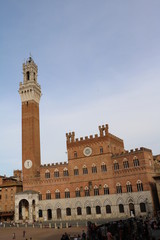 Fototapeta na wymiar Palazzo pubblico, Cappella di Piazza and Torre del Mangia in Siena, Tuscany Italy