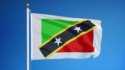 Saint Kitts and Nevis flag waving against clean blue sky, close up, isolated with clipping path mask alpha channel transparency