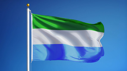 Sierra Leone flag waving against clean blue sky, close up, isolated with clipping path mask alpha channel transparency
