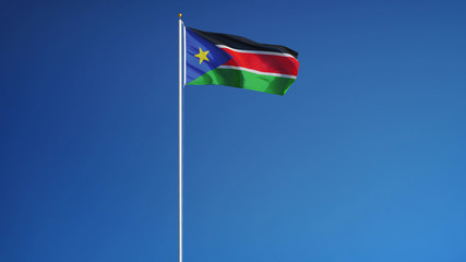 South Sudan flag waving against clean blue sky, long shot, isolated with clipping path mask alpha channel transparency