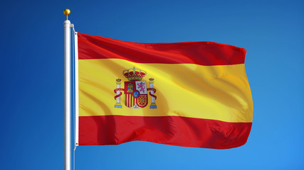 Spain flag waving against clean blue sky, close up, isolated with clipping path mask alpha channel...