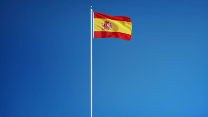 Spain flag waving against clean blue sky, long shot, isolated with clipping path mask alpha channel transparency