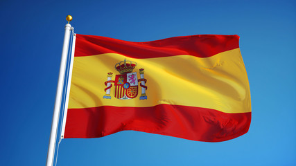 Spain flag waving against clean blue sky, close up, isolated with clipping path mask alpha channel transparency