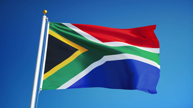 South Africa flag waving against clean blue sky, close up, isolated with clipping path mask alpha channel transparency