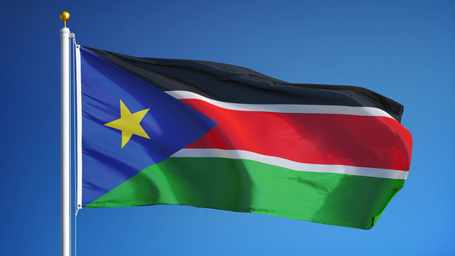 South Sudan flag waving against clean blue sky, close up, isolated with clipping path mask alpha channel transparency