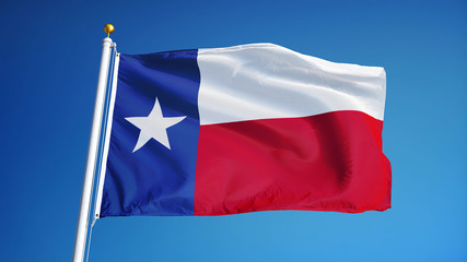 Naklejka premium Texas flag waving against clean blue sky, close up, isolated with clipping path mask alpha channel transparency