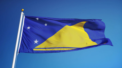 Tokelau flag waving against clean blue sky, close up, isolated with clipping path mask alpha channel transparency