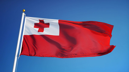 Tonga flag waving against clean blue sky, close up, isolated with clipping path mask alpha channel transparency