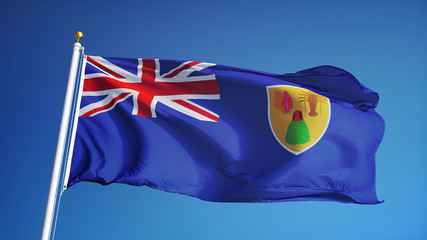Turks and Caicos Islands flag waving against clean blue sky, close up, isolated with clipping path mask alpha channel transparency